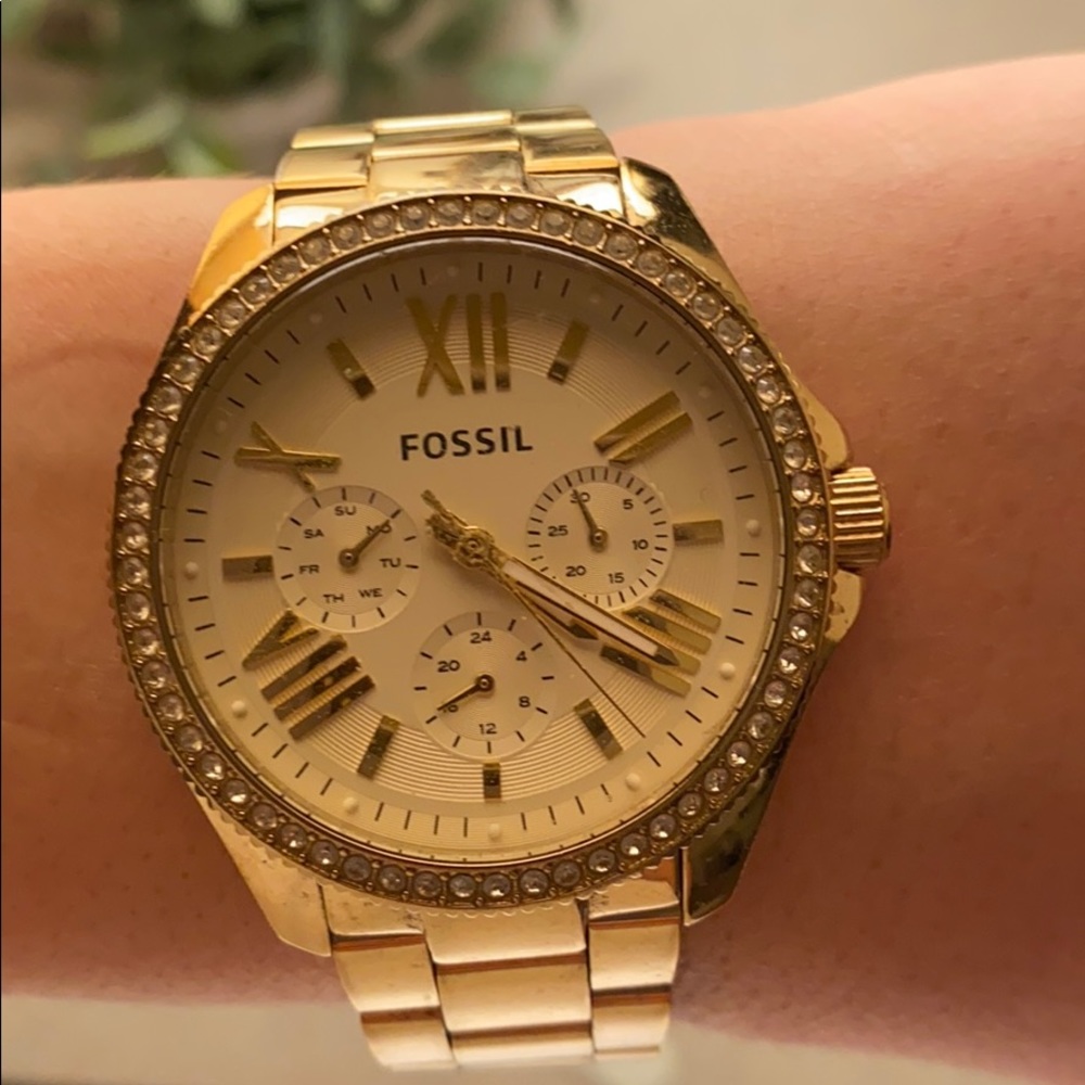 Gold fossil watch